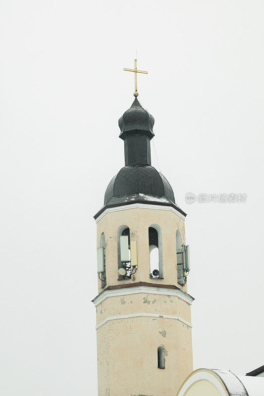 Chernihiv, Ukraine - February 3, 2024. The modern and historical architecture of the city is covered in snow. it snowed on the weekend, but people are walking. gray and cloudy sky